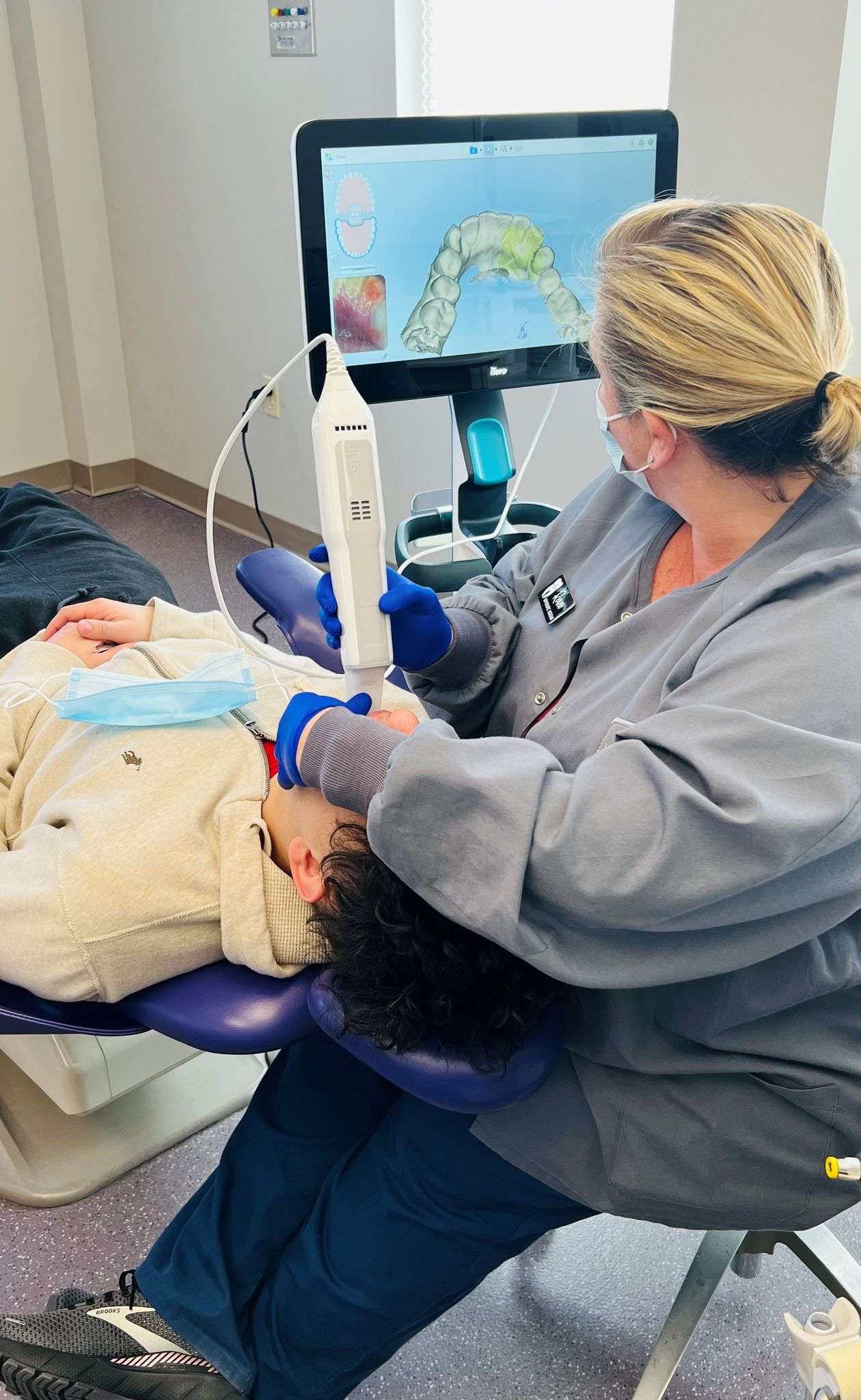 Dentist cleaning Patients teeth